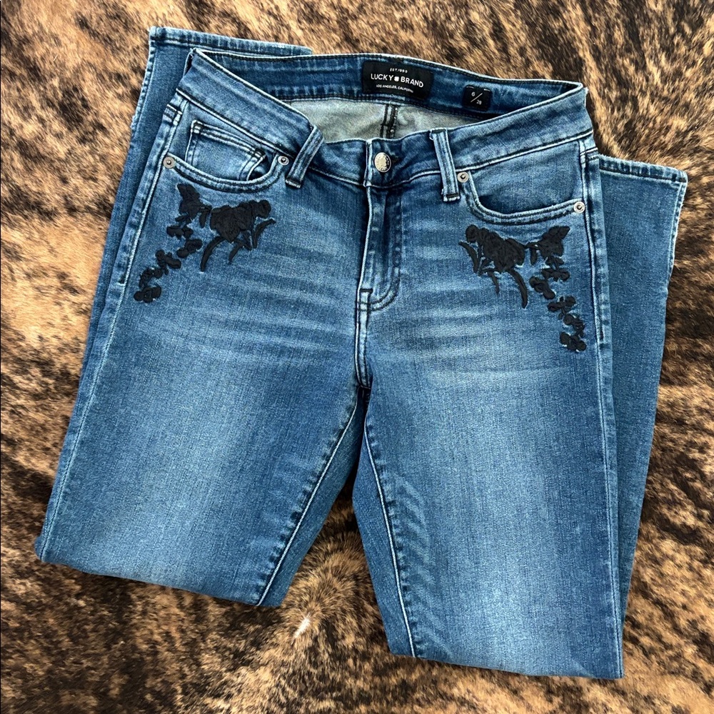 Lucky Brand skinny jeans with Black Floral Detail